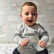 Morgan joined the competition — help win amazing prizes! baby, babylaughing, bodypart, clothing, face, finger, hand, happy, head, indoors, jeans, laughing, pants, person, photography, portrait, shirt, sitting, smile, text