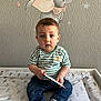 Morgan joined the competition — help win amazing prizes! baby, blade, boy, child, clothing, dagger, face, furniture, head, hosiery, indoors, jeans, knife, male, pants, person, photography, portrait, sitting, sock