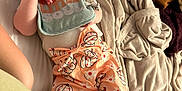 Ellie is registered to the contest to win money with this photo: baby, bed, bedroom, blanket, clothing, couch, cushion, face, furniture, hat, head, homedecor, indoors, newborn, person, photography, portrait, quilt, room, sleeping