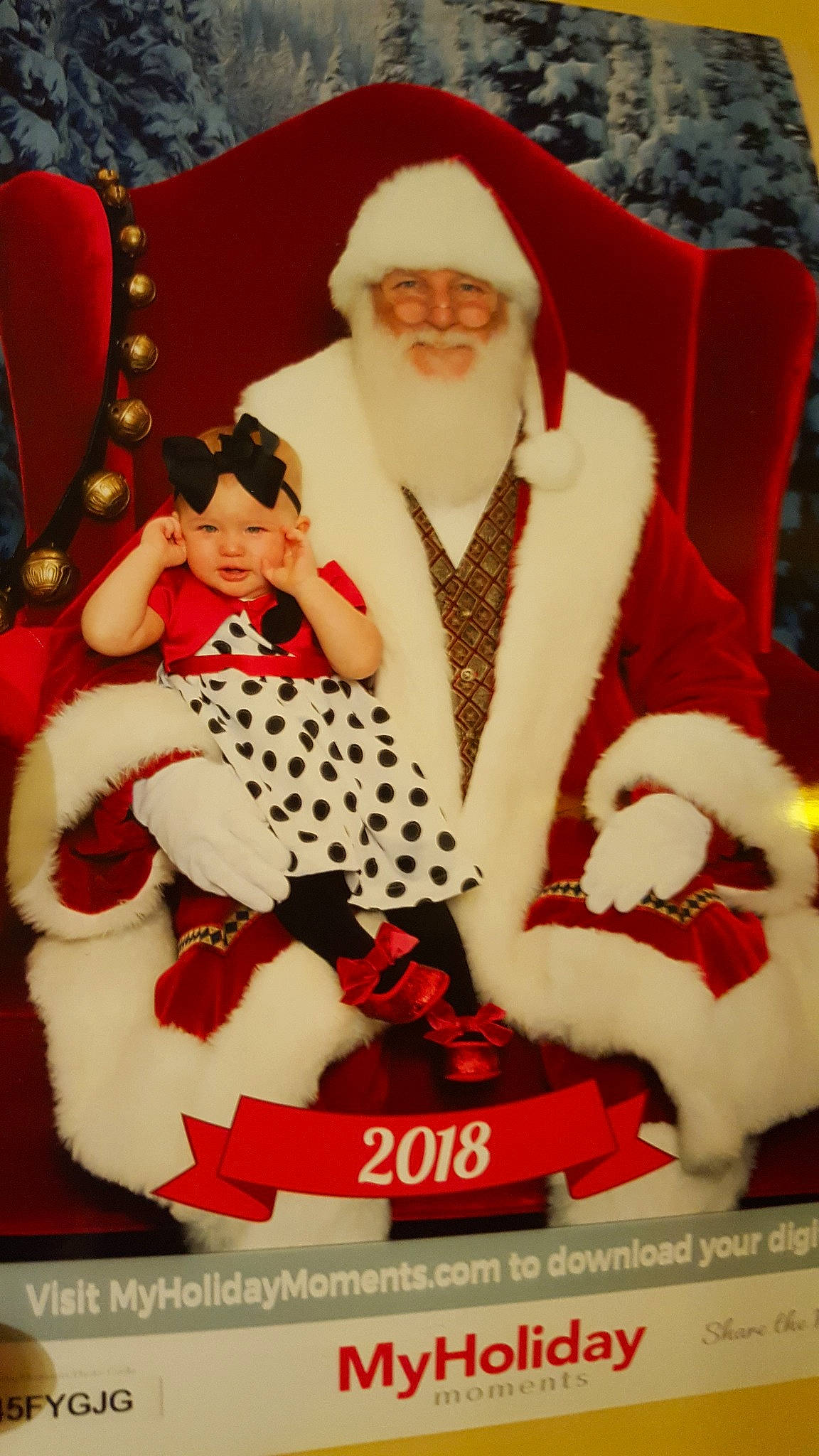 Carina is registered to the contest to win money with this photo: christmas, fictional_character, headwear, holiday, lap, person, santa_claus