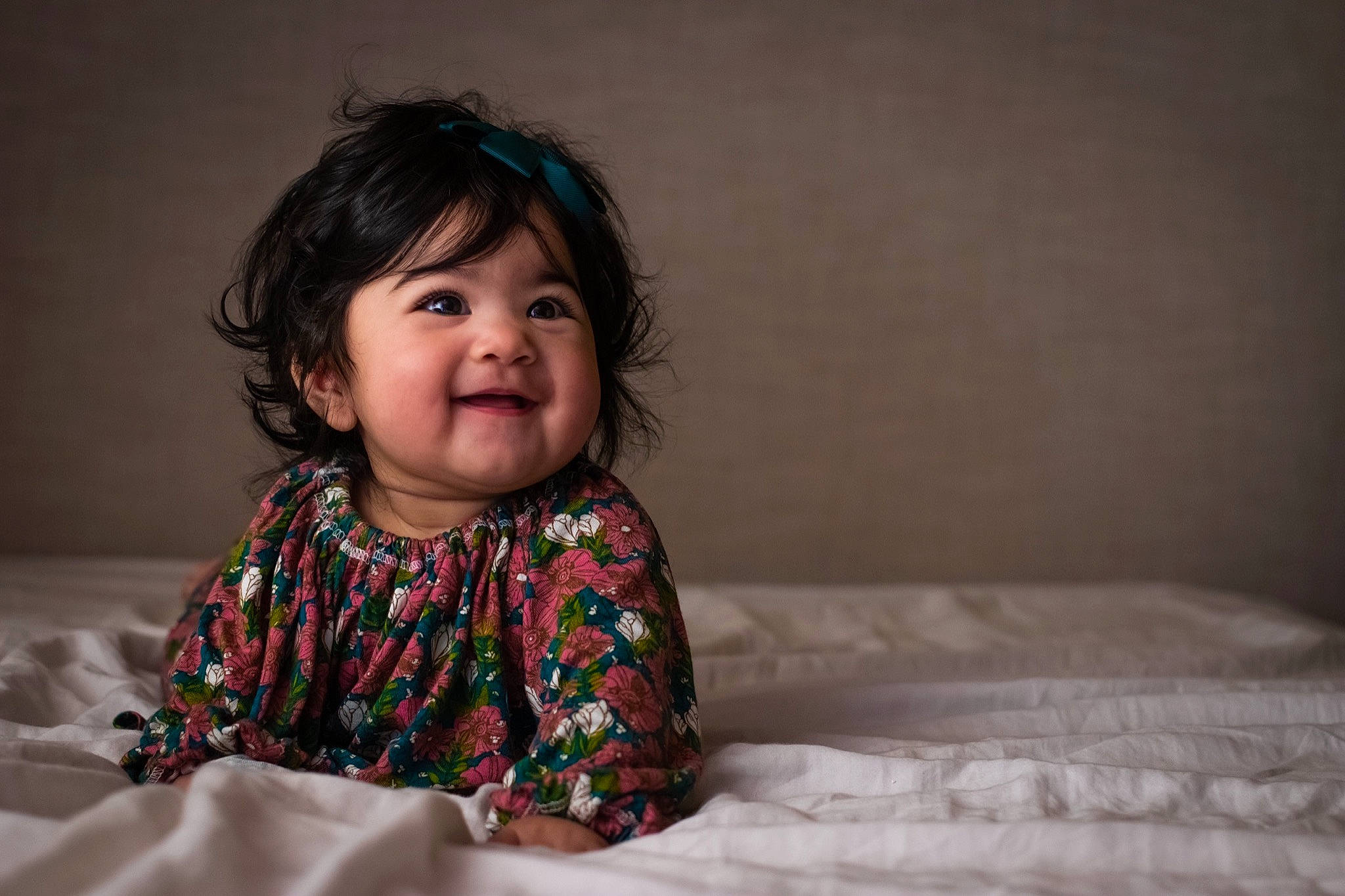 Amelie is registered to the contest to win money with this photo: baby, cheek, child, chin, eye, face, happy, human, iris, nose, person, photography, portrait, portrait_photography, sitting, skin, smile, toddler