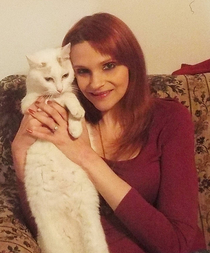 Ryan is registered to the contest to win money with this photo: brown_hair, cat, cat_like_mammal, ear, forehead, fur, fur_clothing, girl, hairstyle, human_hair_color, joy, kitten, long_hair, mammal, person, selfie, skin, small_to_medium_sized_cats, smile, textile