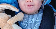 Evan participe au concours pour gagner de l'argent avec cette photo : baby, blanket, blue_blanket, blue_eyes, car_seat, child, closeup, cozy, cute, eyelashes, fabric, hand, infant, plush_toy, portrait, smile, soft_toy, stroller, sweater, toy