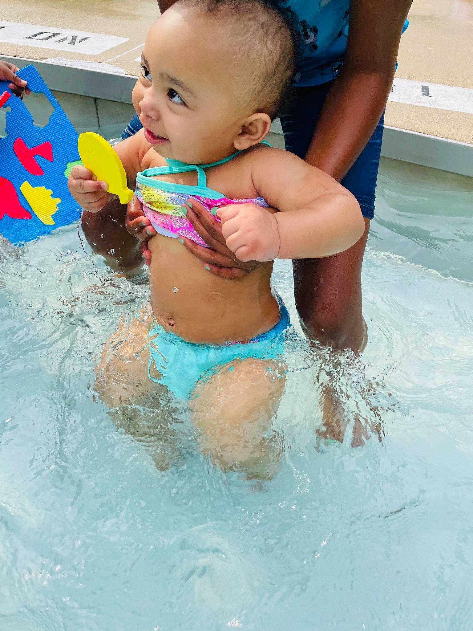 Gabrielle is registered to the contest to win money with this photo: baby, bathing, beauty, blue, brassiere, chest, fun, happy, leisure, person, photograph, recreation, skin, swimming_pool, swimwear, thigh, toddler, trunk, undergarment, underpants