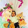 Hethav joined the competition — help win amazing prizes! baby, child, smiling, stuffed_animal, plush_toy, flower, blanket, soft_toy, cuddly, happy, cute, indoor, portrait, lying_down, colorful, toy_dog, toy_bear, toy_unicorn, casual_clothing, playful
