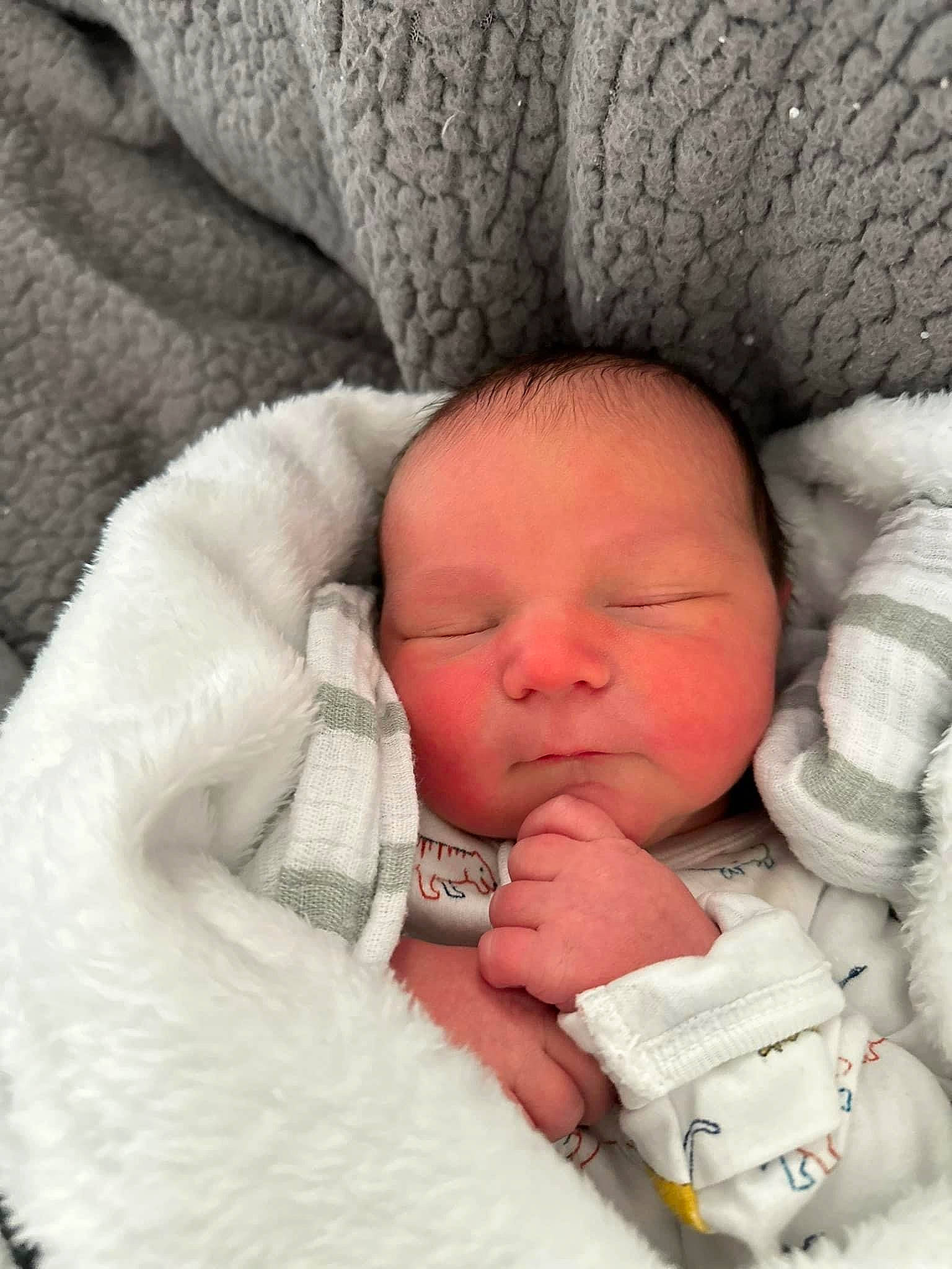 Waylon is registered to the contest to win money with this photo: baby, baby_products, baby_sleeping, baby_toddler_clothing, bedding, bedtime, cheek, child, comfort, face, gesture, head, linens, nail, nap, nose, person, sleep, textile, thumb