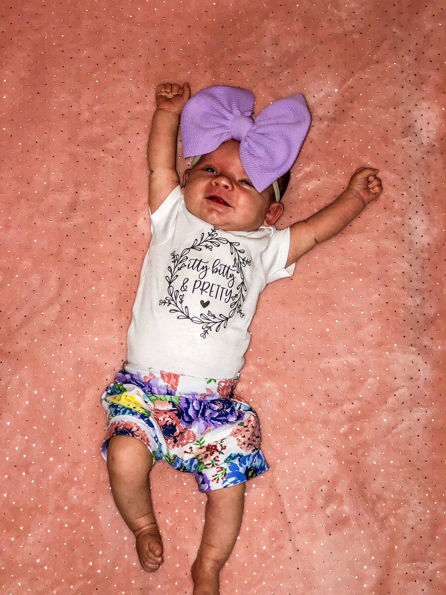 Oakleigh is registered to the contest to win money with this photo: baby_toddler_clothing, baseball_cap, cap, eye, finger, fun, hand, happy, hat, headwear, human_body, human_leg, leg, leisure, person, pink, shorts, sleeve, t_shirt, thigh