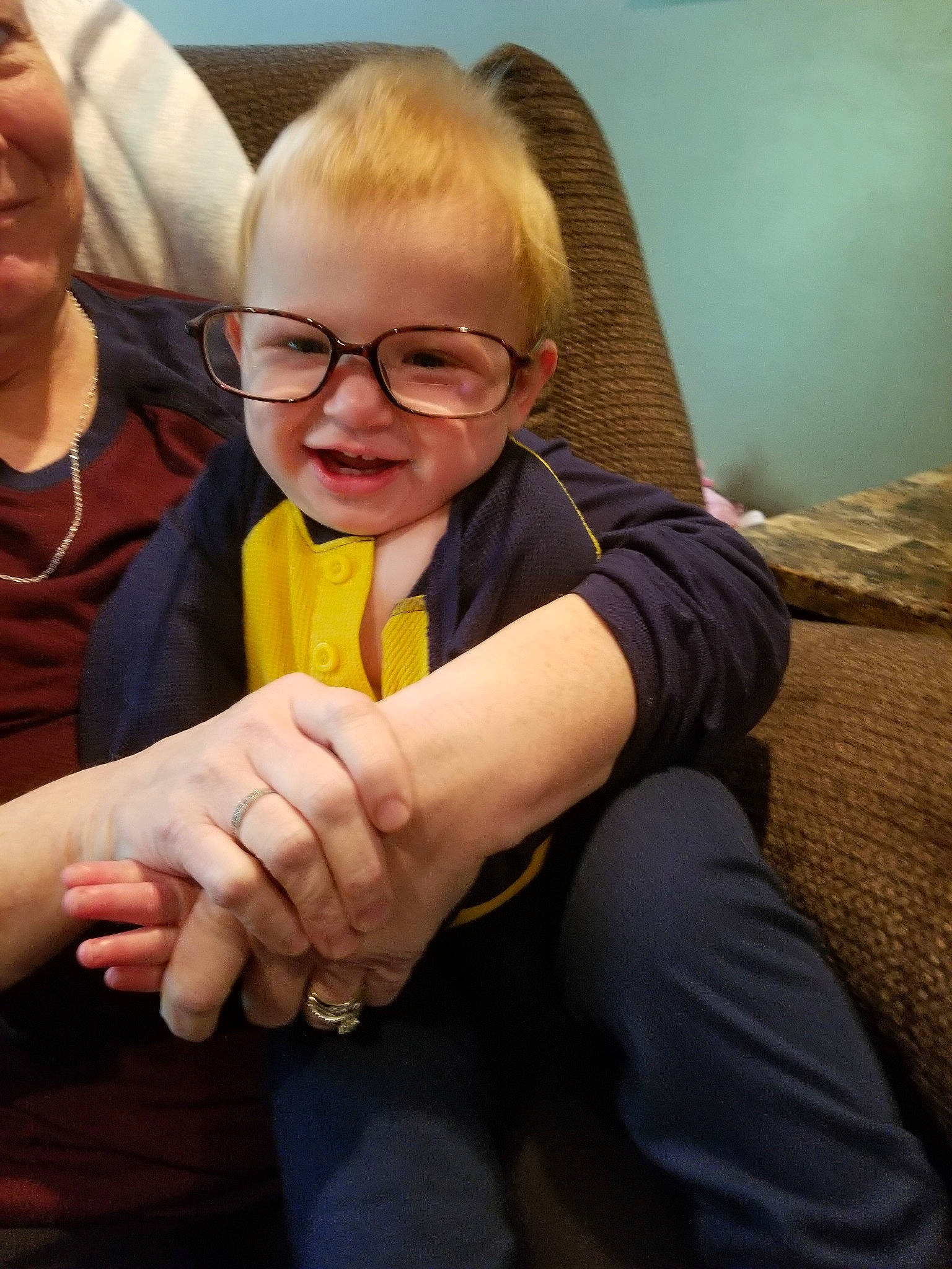 Maverick is registered to the contest to win money with this photo: arm, child, eyewear, finger, fun, gesture, glasses, hand, happy, joy, person, smile, thumb, tooth, vacation, vision_care