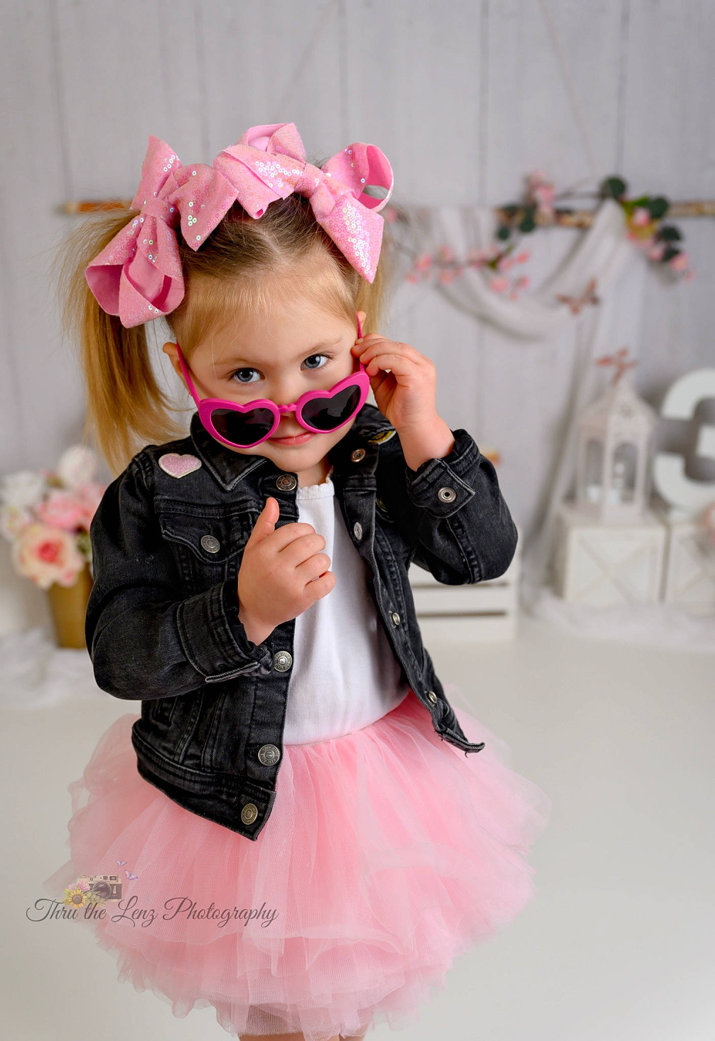 Emelia is registered to the contest to win money with this photo: baby_toddler_clothing, dress, eyelash, facial_expression, fashion_design, goggles, hairstyle, happy, hat, headband, headpiece, lip, magenta, neck, necklace, person, pink, skin, sleeve, sunglasses