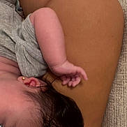 Isabella joined the competition — help win amazing prizes! baby, sleeping, arm, earring, skin, hand, resting, close_up, soft_texture, human, infant, peaceful, toddler, skin_tone, hair, gray_clothing, cushion, comfort, relaxation, intimate
