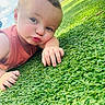 Ozzy is registered to the contest to win money with this photo: baby, child, infant, portrait, face, pouting, curious, outdoor, grass, artificial_grass, backyard, sunlight, sky, clouds, pink_shirt, sleeveless, hands, crawling, close_up, playful