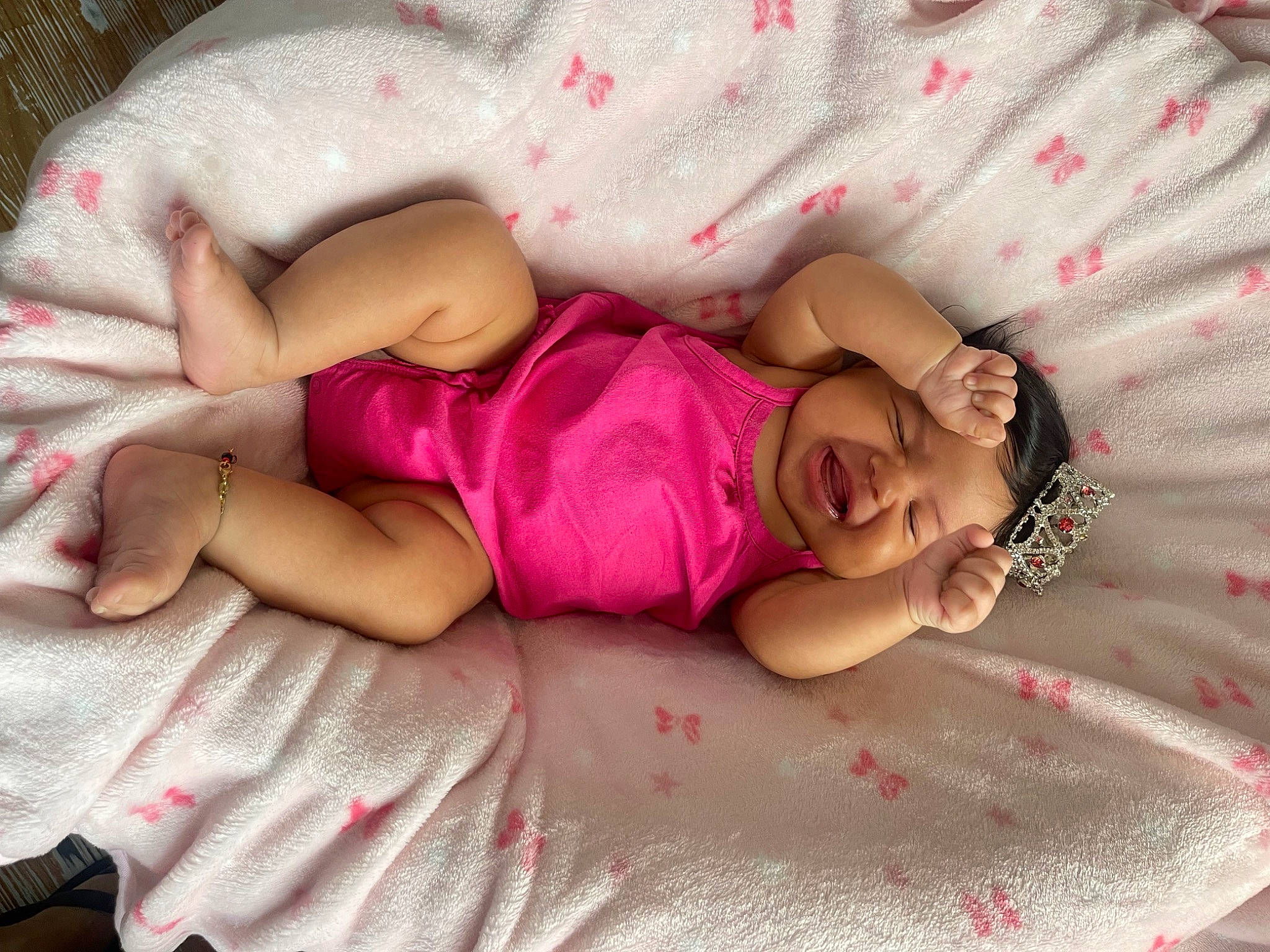 Lilibeth is registered to the contest to win money with this photo: arm, baby, baby_sleeping, baby_toddler_clothing, bed, bedding, comfort, face, finger, hand, headwear, human_body, leg, linens, person, pink, skin, smile, textile, thigh