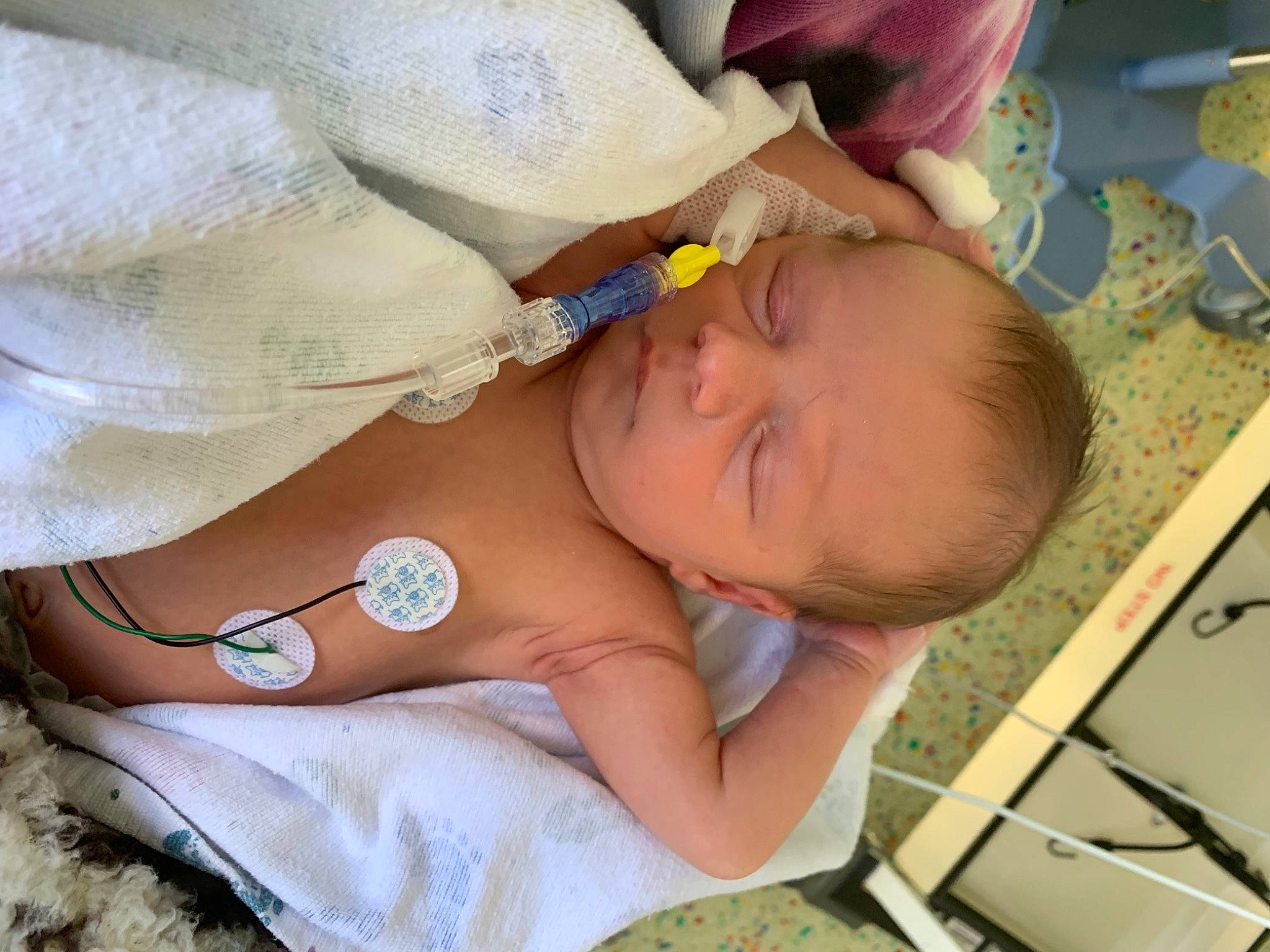 Oliver is registered to the contest to win money with this photo: abdomen, baby, baby_products, baby_sleeping, baby_toddler_clothing, bedtime, bracelet, chest, child, comfort, fashion_accessory, finger, glasses, happy, jewellery, nail, pattern, person, skin, toddler