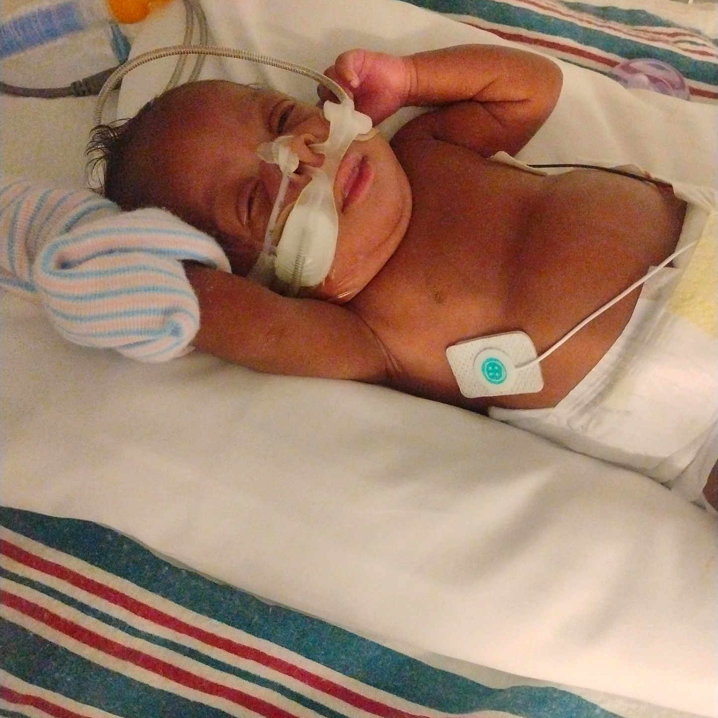 Lilliann joined the competition — help win amazing prizes! architecture, baby, ball, baseball, baseballball, bed, blanket, building, clothing, face, furniture, glove, head, hospital, indoors, newborn, person, photography, portrait, sport