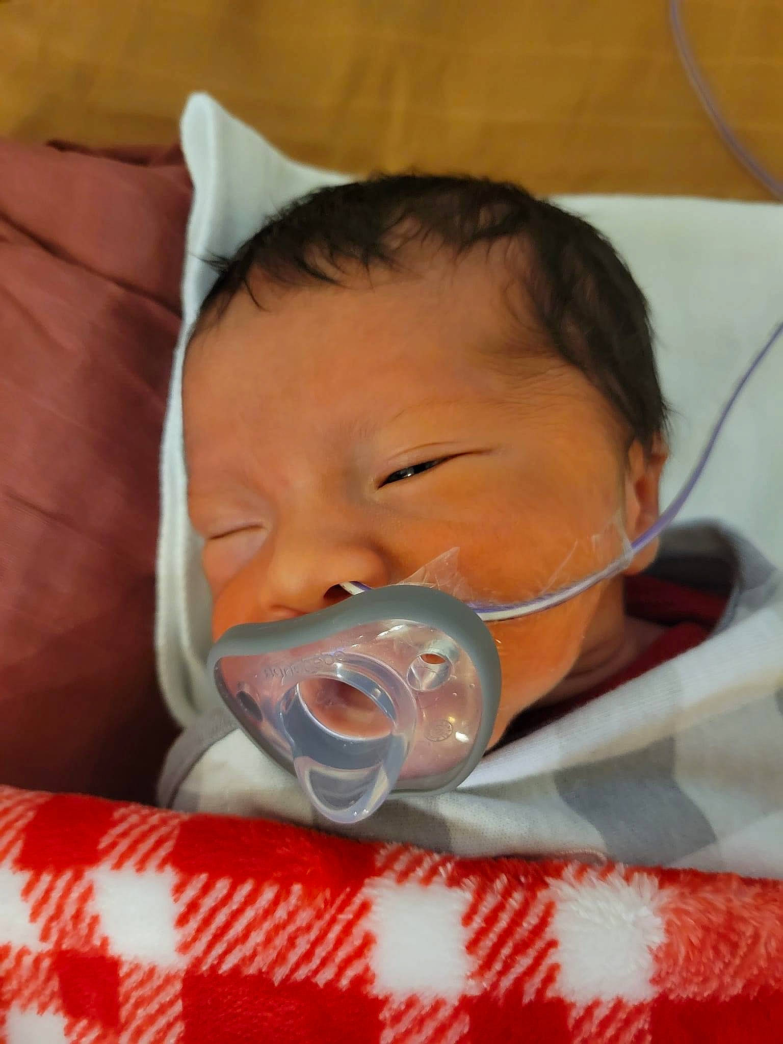 Deluca is registered to the contest to win money with this photo: baby, baby_toddler_clothing, cheek, child, chin, comfort, drinkware, ear, eyebrow, eyelash, finger, fun, happy, head, iris, lip, mouth, nose, person, skin