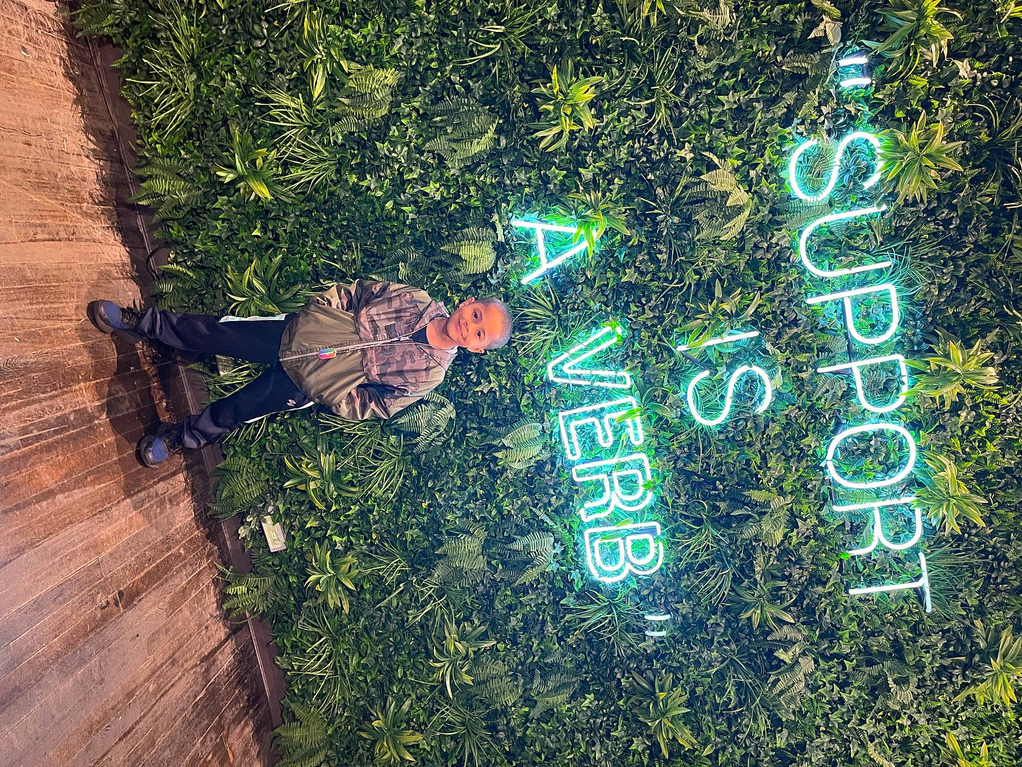 Jaylen joined the competition — help win amazing prizes! asphalt, circle, event, font, graphics, grass, happy, holiday, joy, landscape, organism, ornament, people_in_nature, person, plant, road_surface, shadow, shrub, soil, street_light