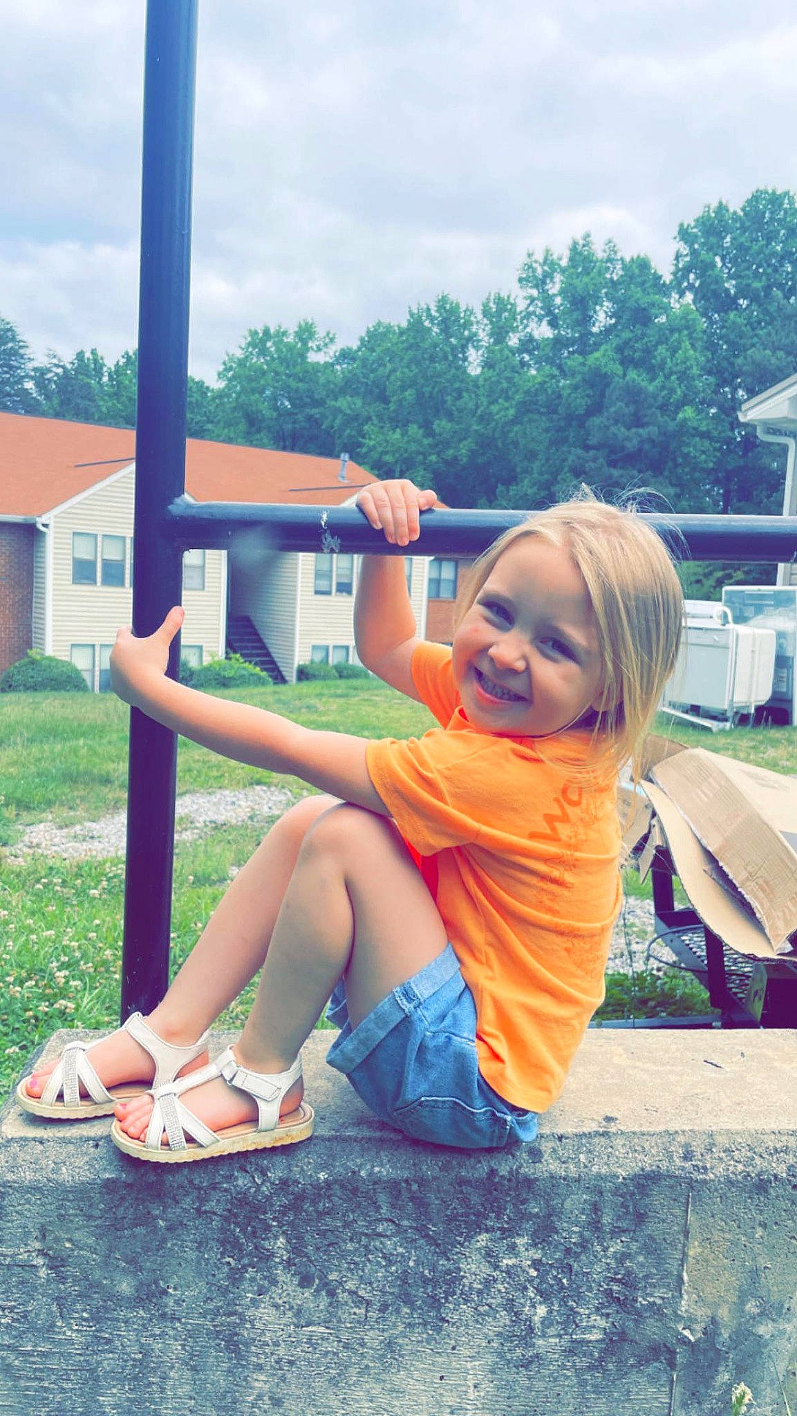 Teigan is registered to the contest to win money with this photo: child, city, electric_blue, fun, grass, hand, happy, human_leg, joy, leisure, person, plant, recreation, sitting, sky, smile, sneakers, summer, t_shirt, toddler