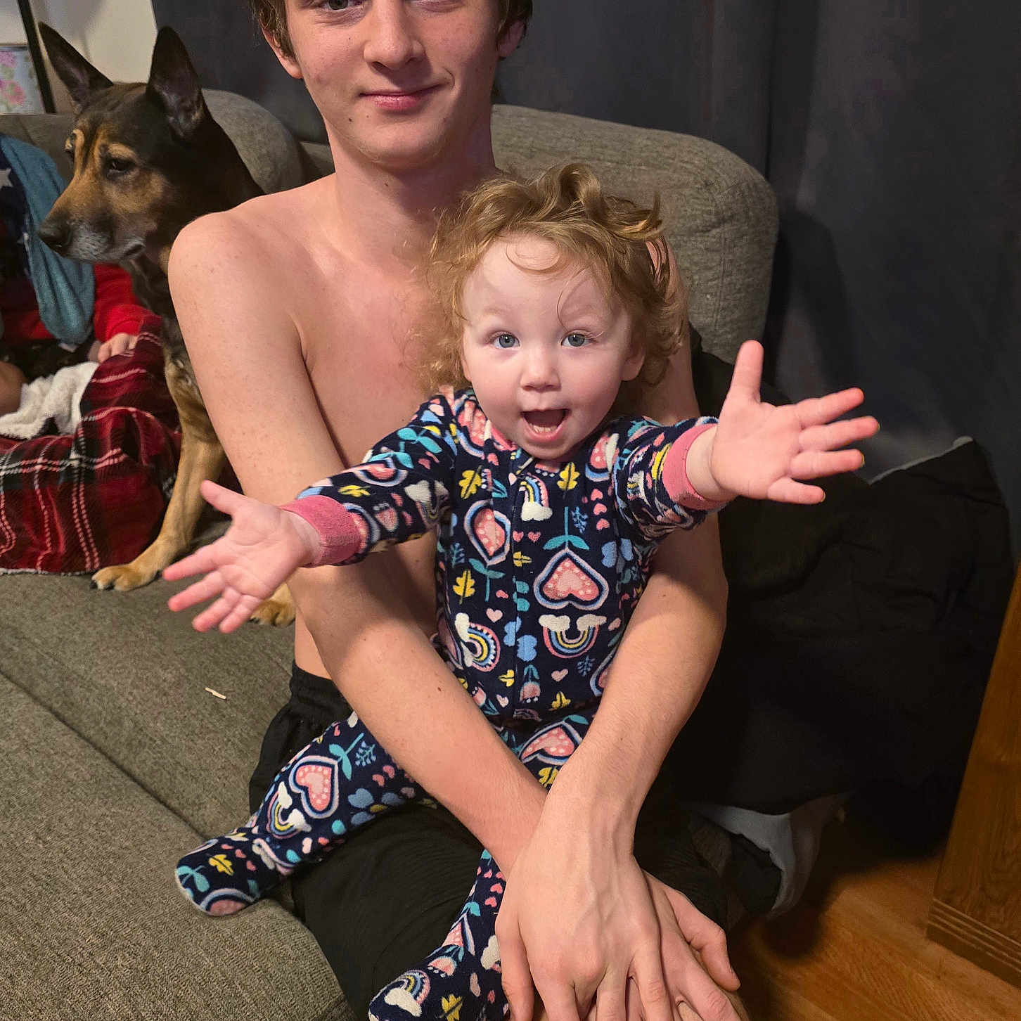 Trinity is registered to the contest to win money with this photo: animal, architecture, baby, bodypart, building, canine, couch, face, finger, furniture, hand, head, indoors, interiordesign, livingroom, people, person, photography, portrait, room