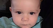 Skyler joined the competition — help win amazing prizes! baby, blue_eyes, casual_wear, child, closeup, clothing, cute, expressionless, face, head, human, indoors, infant, looking_at_camera, person, portrait, sitting, skin, young, young_child