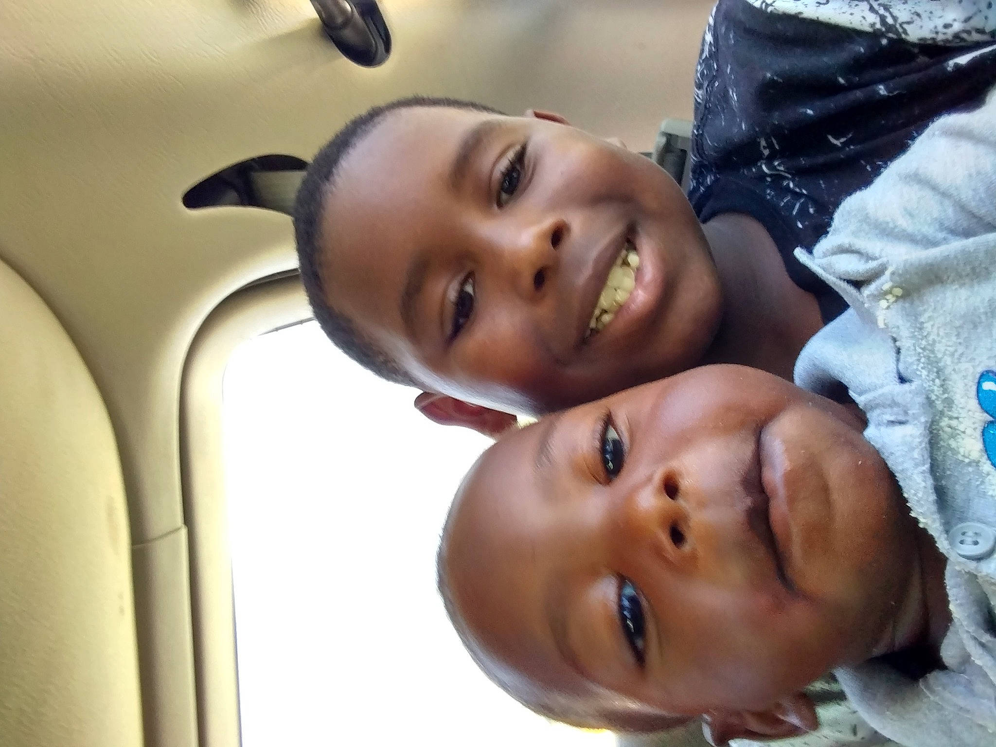 Brayden is registered to the contest to win money with this photo: baby, black_hair, cheek, child, chin, eyebrow, eyelash, flash_photography, forehead, fun, gesture, happy, joy, lip, mouth, neck, nose, person, skin, smile