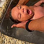 Cailand is registered to the contest to win money with this photo: baby, infant, sink, water, hands, kitchen, bath, smile, person, skin, arm, countertop, granite, wet, support, expression, care, cleaning, young_child, domestic