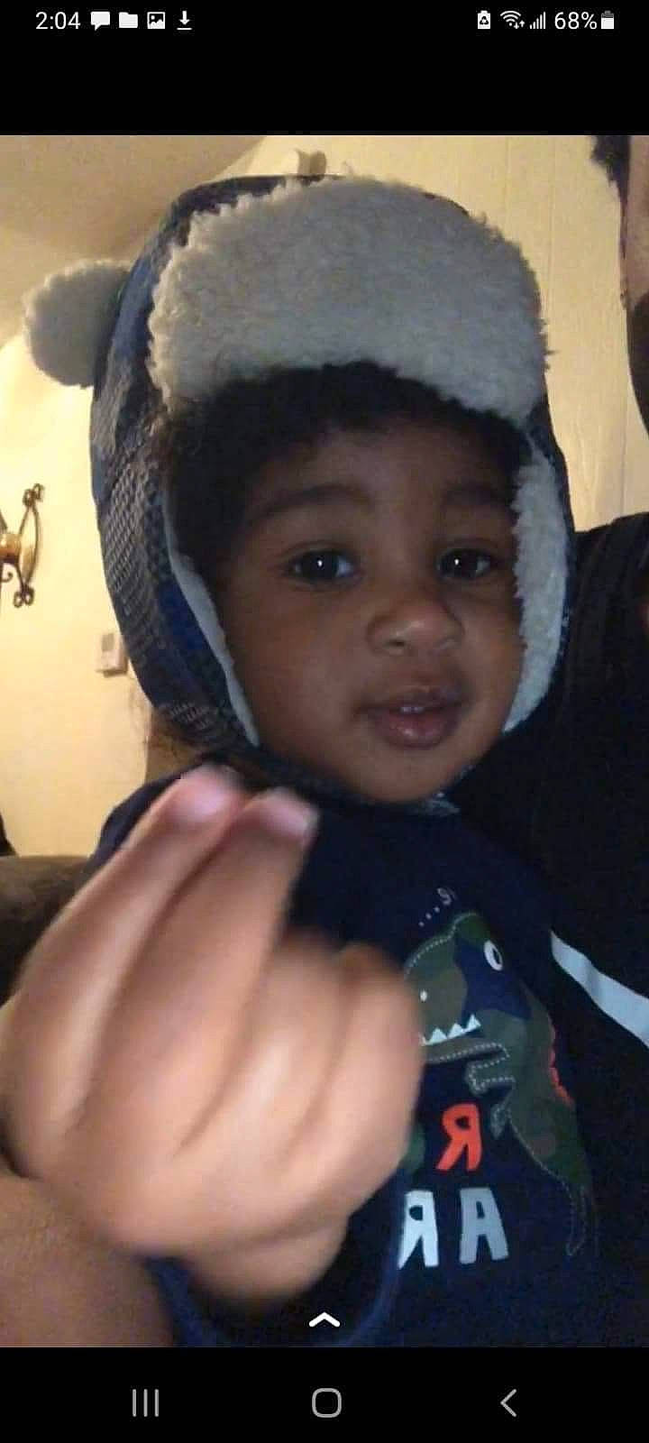 Nehemiah is registered to the contest to win money with this photo: cap, cheek, chin, cool, ear, eye, eyebrow, face, facial_expression, gesture, hairstyle, happy, headgear, iris, lip, mouth, nose, organ, person, skin