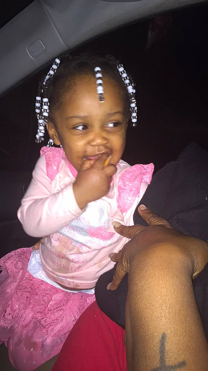 Kailyn is registered to the contest to win money with this photo: baby, black_hair, cheek, child, ear, eyebrow, face, finger, fun, head, human, lip, mouth, neck, person, pink, skin, smile, thumb, toddler