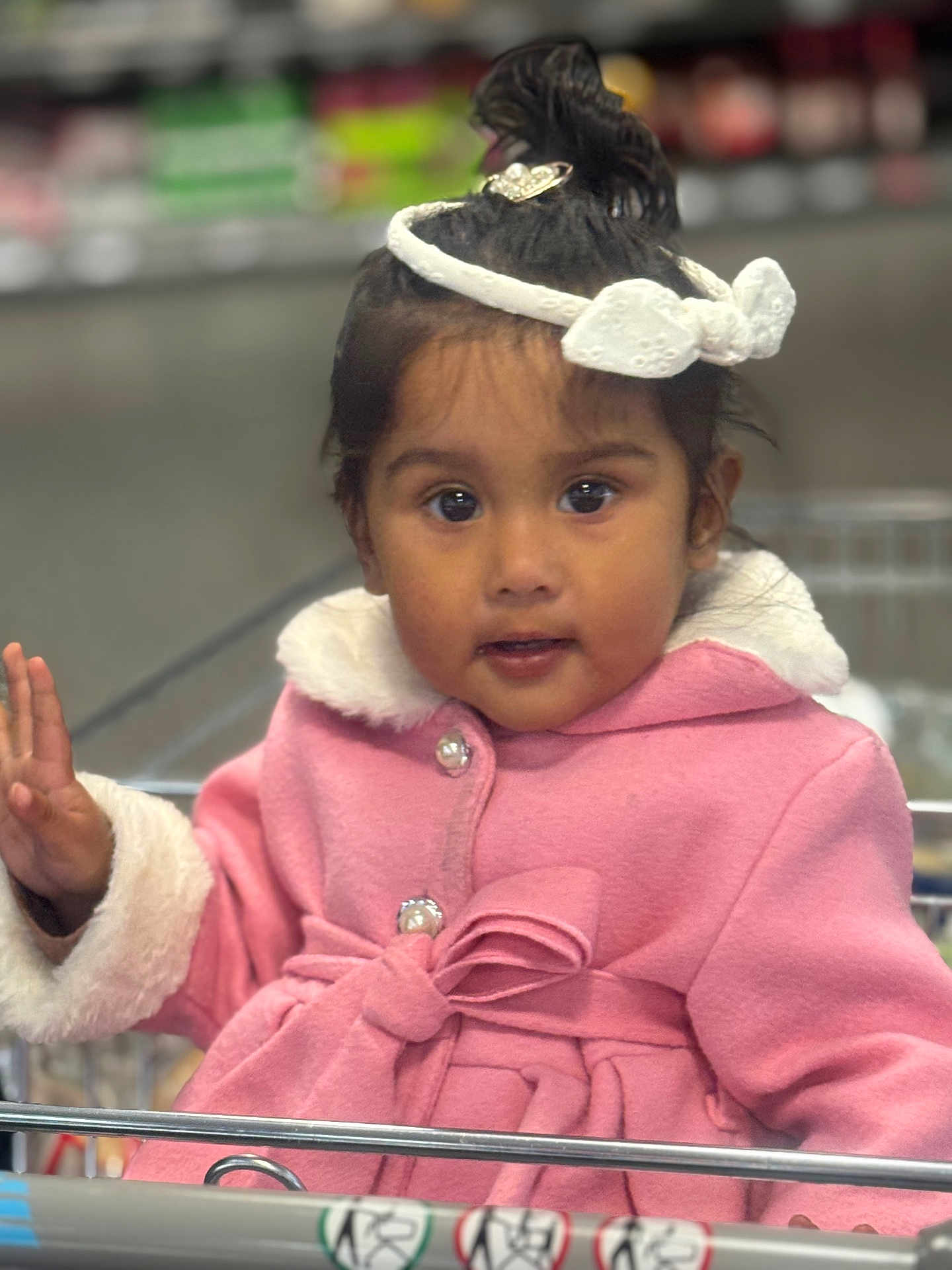 Harleen is registered to the contest to win money with this photo: accessories, baby, blackhair, bodypart, clothing, coat, face, finger, hair, hand, happy, hat, head, jacket, knitwear, person, photography, portrait, sweater, sweatshirt