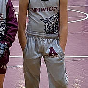 Teagan joined the competition — help win amazing prizes! child, girl, wrestling, gymnasium, wrestling_mat, team_uniform, mini_matcats, smile, portrait, pink_shoes, sneakers, athlete, teammates, bleachers, spectator, wheelchair, hands_in_pockets, indoor_sports, youth, competition