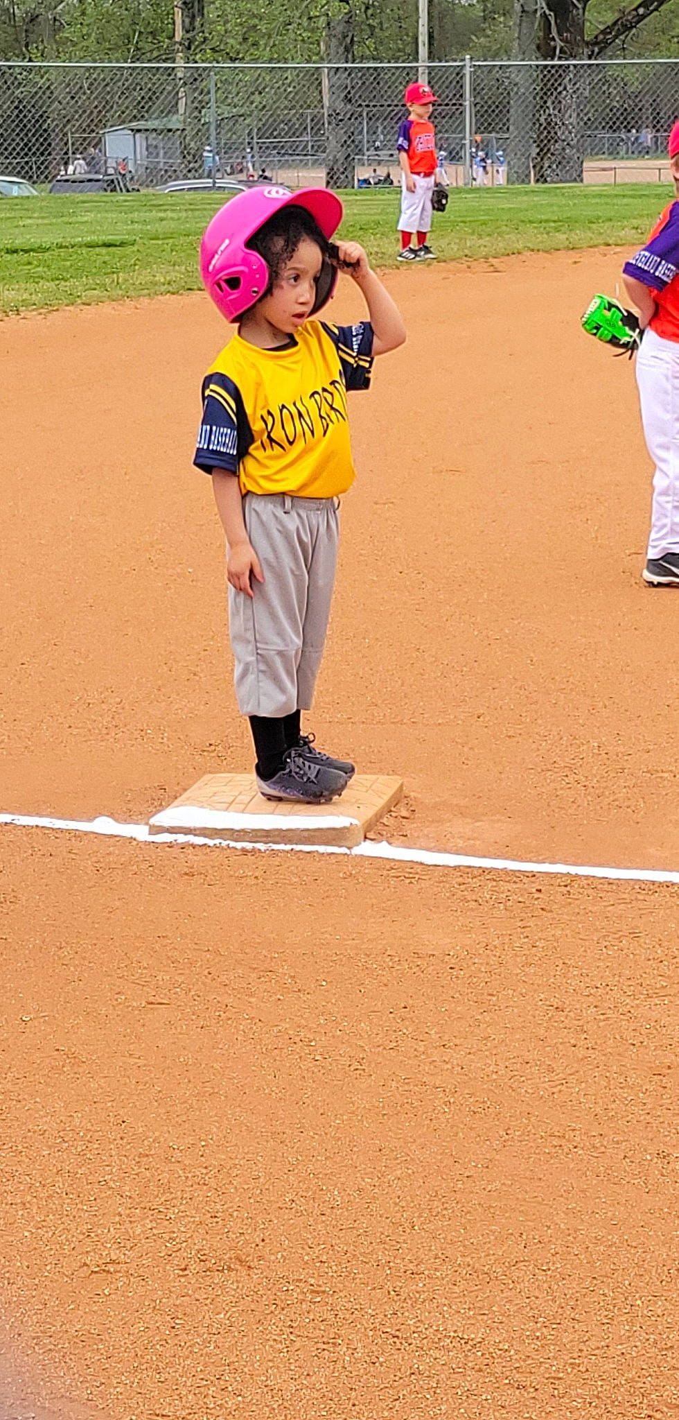 Makenna joined the competition — help win amazing prizes! ball_game, baseball, baseball_equipment, baseball_field, baseball_park, baseball_player, baseball_positions, baseball_protective_gear, bat_and_ball_games, college_baseball, competition_event, grass, person, pink, player, shoe, sneakers, sports, sports_equipment, sports_gear