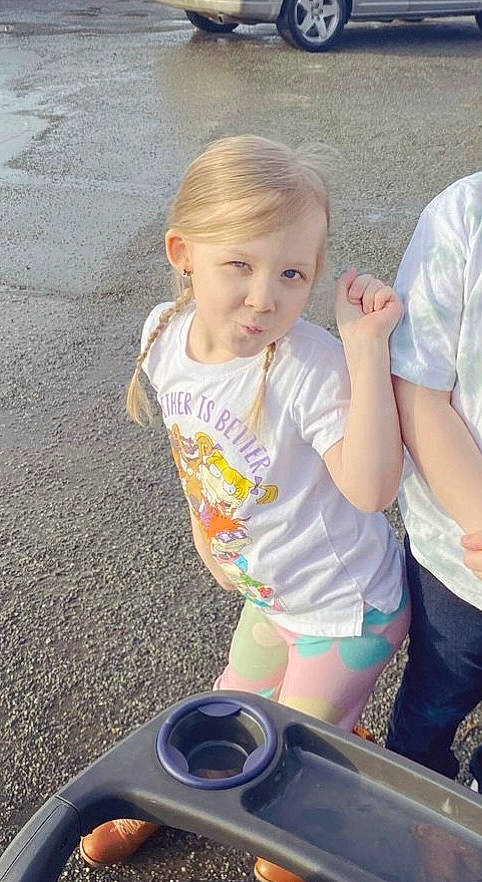 Averie joined the competition — help win amazing prizes! asphalt, audio_equipment, chair, chest, child, fun, happy, leisure, person, play, recreation, road_surface, shorts, sitting, sleeve, t_shirt, table, toddler, vacation