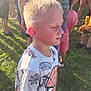Jacob is registered to the contest to win money with this photo: child, boy, blond_hair, spiderman_shirt, outdoor, grass, sunlight, people, crowd, toy, stuffed_animal, casual_clothing, summer, daylight, event, portrait, profile, standing, kids, fun