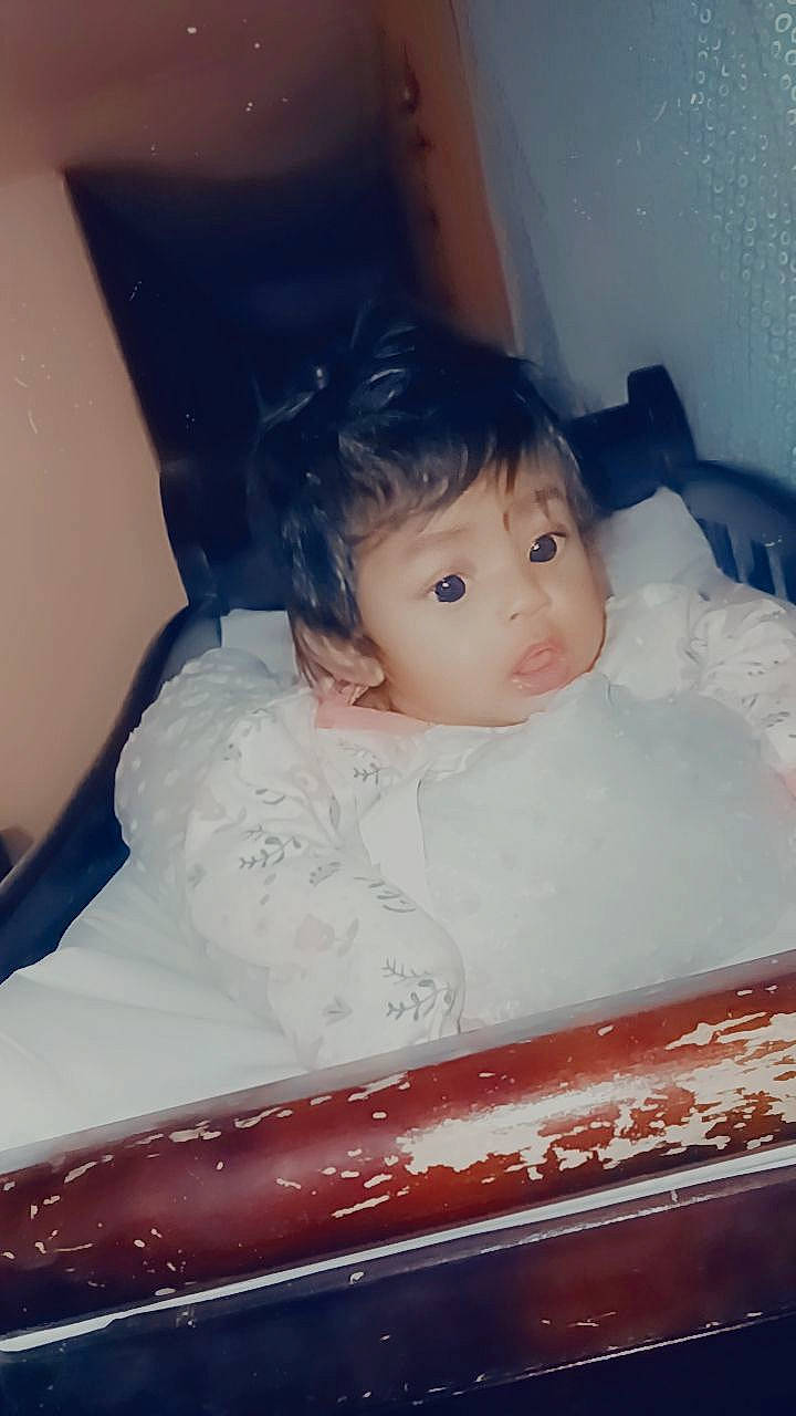 Anaya is registered to the contest to win money with this photo: baby, cheek, child, chin, comfort, eye, eyebrow, face, hair, hairstyle, happy, head, human_body, iris, lip, nose, person, skin, sleeve, smile