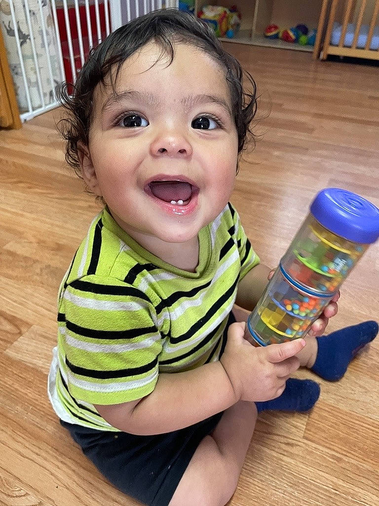 Jose Jr joined the competition — help win amazing prizes! baby, baby_playing_with_toys, baby_toddler_clothing, cheek, child, drinkware, eye, eyelash, finger, fun, hairstyle, hand, happy, person, plastic_bottle, skin, sleeve, smile, thumb, toddler