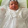 Miko is registered to the contest to win money with this photo: baby, infant, white_gown, lace, headband, portrait, close_up, newborn, cute, soft_fabric, delicate, embroidery, hands, face, lying_down, indoors, child, adorable, sleepwear, blanket