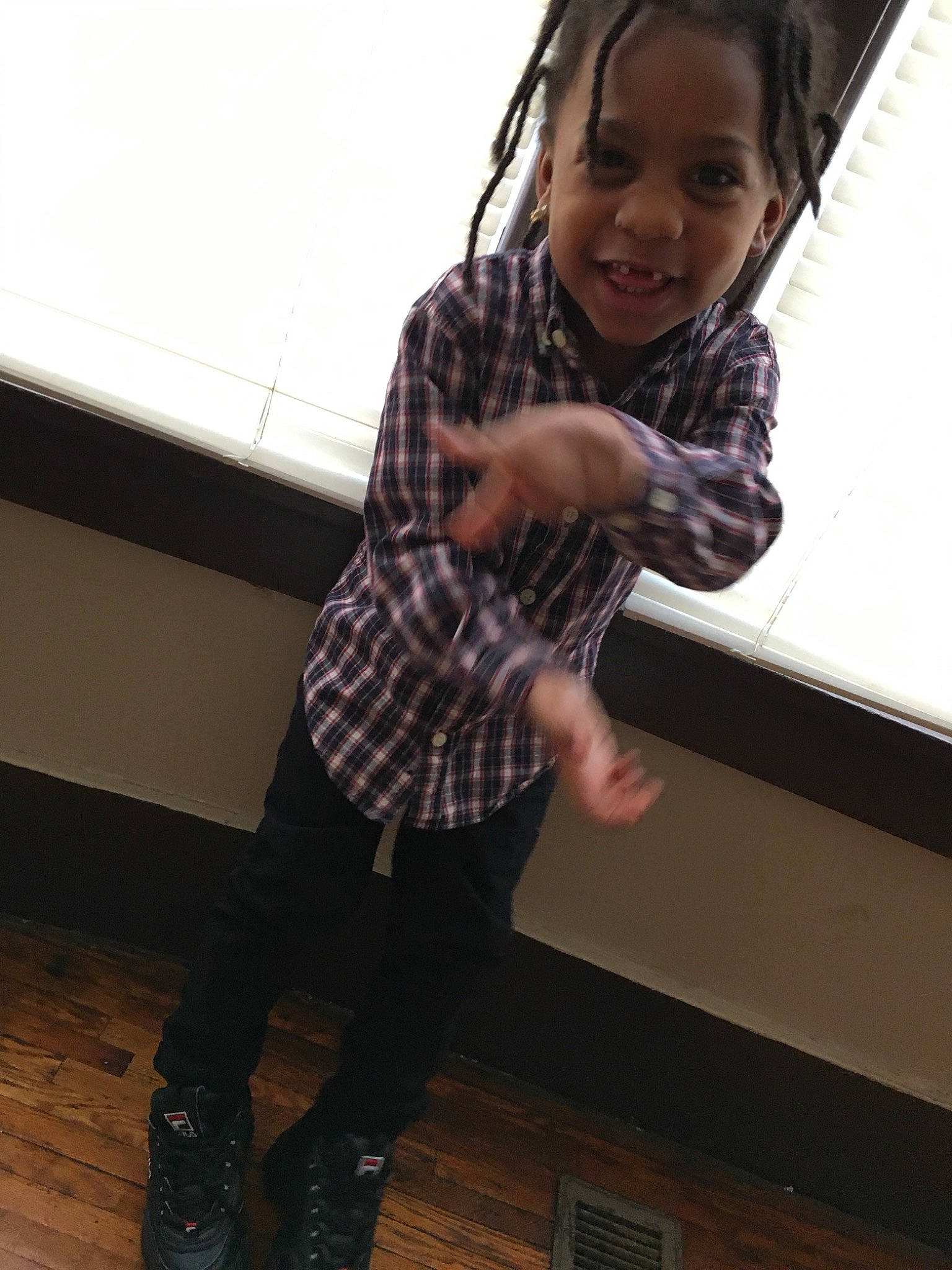 Prince is registered to the contest to win money with this photo: child, design, footwear, jeans, joy, leg, pattern, person, photography, shoe, smile, t_shirt, toddler