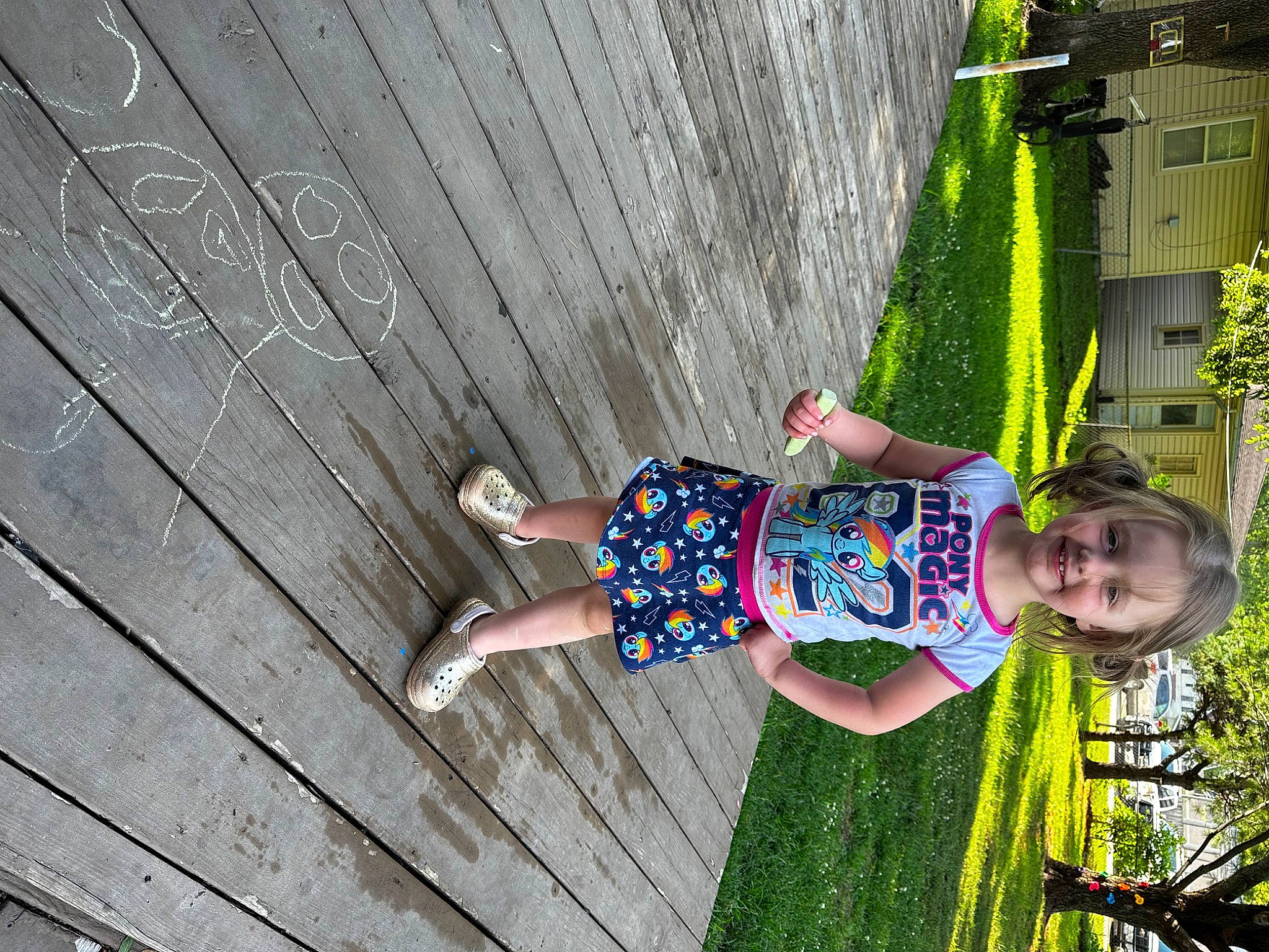 Harlee is registered to the contest to win money with this photo: baby_toddler_clothing, child, electric_blue, fun, grass, happy, human_leg, joy, leisure, line, magenta, pattern, people_in_nature, person, plant, recreation, smile, summer, toddler, tree