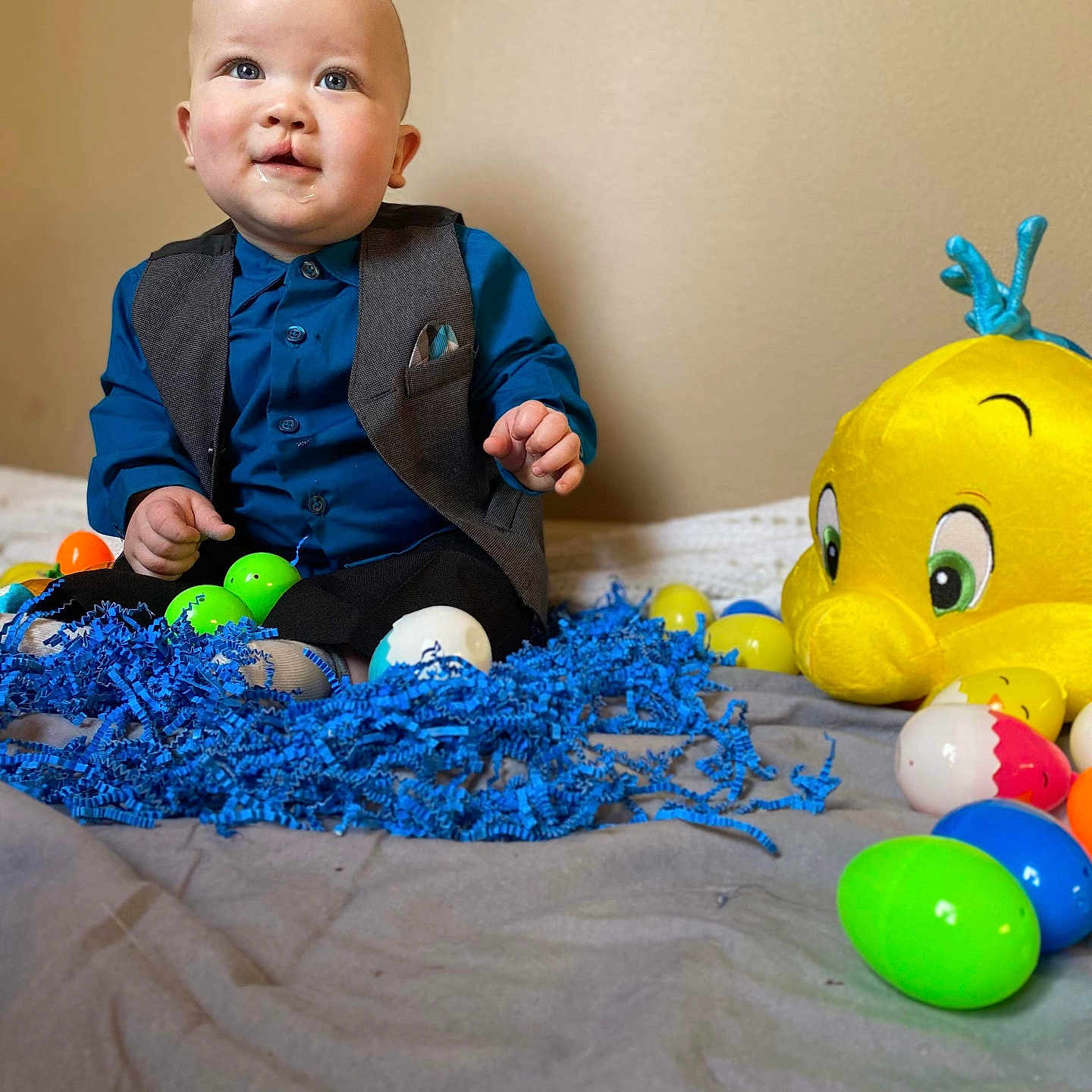 Jaxson is registered to the contest to win money with this photo: baby, ball, balloon, bodypart, clothing, face, football, furniture, happy, head, pants, person, photography, portrait, sitting, smile, soccer, soccerball, sport, toy