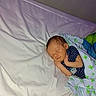 baby, newborn, sleeping, blanket, bed, infant, cozy, cute, child, resting, sleep, indoors, clothing, toddler, person, soft, wrapped, peaceful, small, blankets