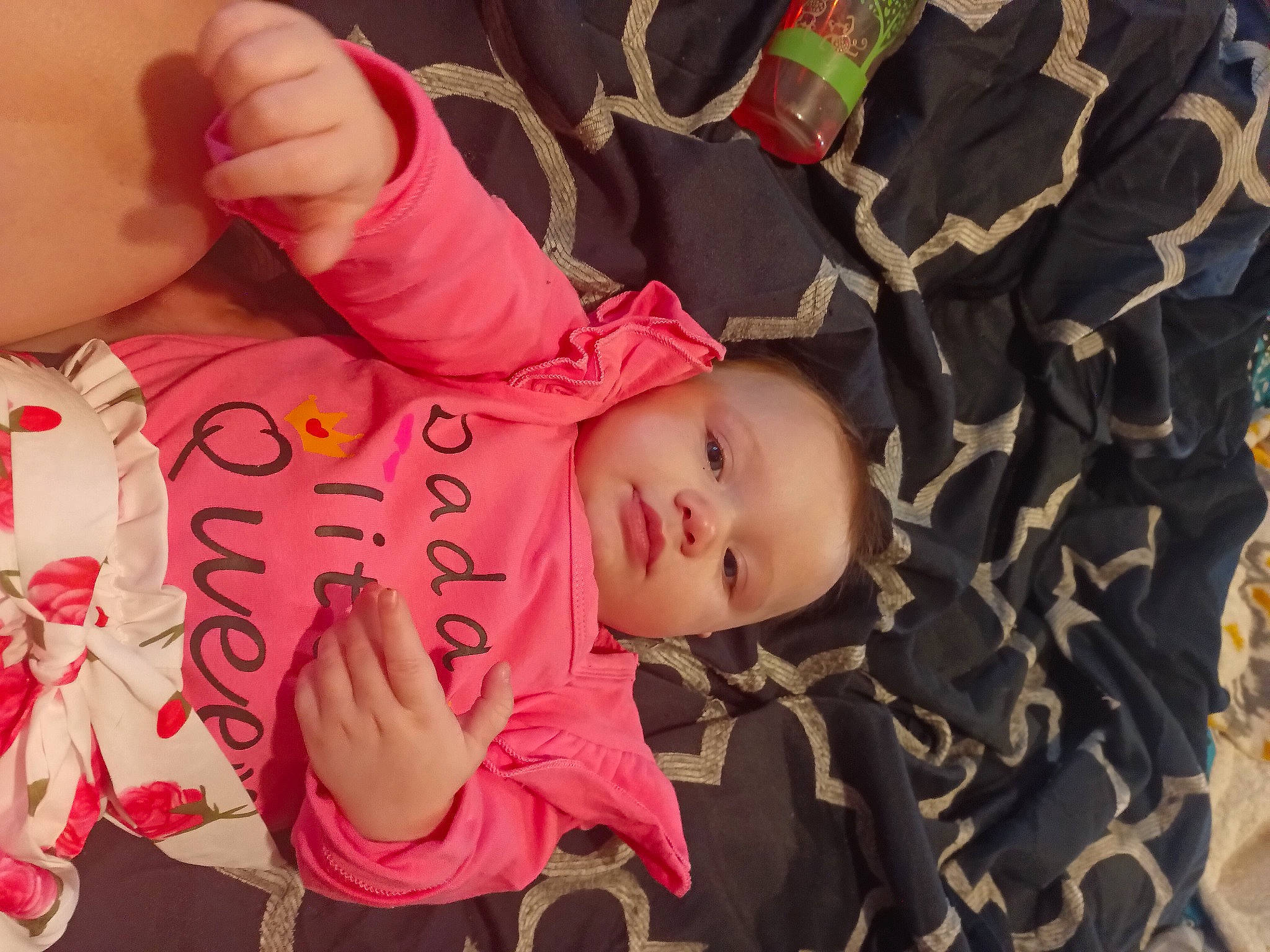 Jamie is registered to the contest to win money with this photo: baby, baby_toddler_clothing, beauty, cheek, child, comfort, finger, gesture, happy, lip, mouth, nail, nose, pattern, person, pink, product, skin, sleeve, textile