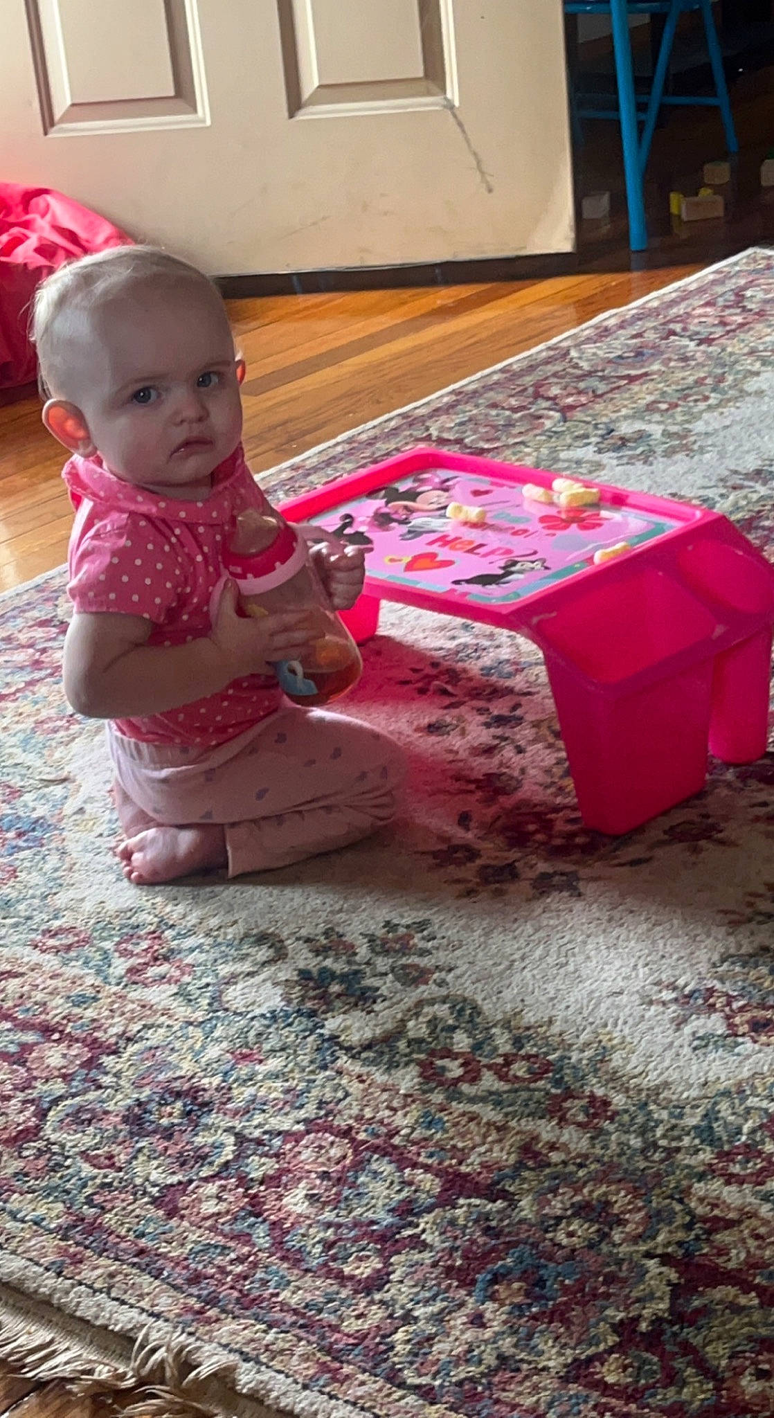 Scarlet is registered to the contest to win money with this photo: baby, baby_toddler_clothing, box, carmine, carpet, child, floor, flooring, fun, hardwood, linens, magenta, person, pink, play, red, room, shipping_box, sitting, toddler