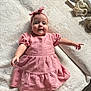 Leni-Rose joined the competition — help win amazing prizes! baby, child, pink_dress, headband, blanket, soft_texture, lying_down, curious, smiling, indoor, infant, cute, patterned_blanket, cozy, portrait, person, small_child, fabric, sleepwear, relaxed