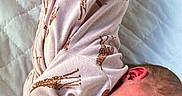 Oaklynn joined the competition — help win amazing prizes! baby, infant, sleeping, yawning, onesie, giraffe_pattern, clothing, quilted_bedspread, soft_texture, newborn, cute, peaceful, lying_down, pajamas, child, face, skin, head, mouth_open, resting