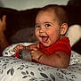 baby, babylaughing, bed, bedroom, bodypart, couch, cushion, face, finger, furniture, hand, happy, head, homedecor, indoors, laughing, person, photography, portrait, smile
