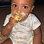 Jamarie Carr is registered to the contest to win money with this photo: toddler, child, messy, food, eating, hands, face, onesie, floor, curious_eyes, indoors, baby, cute, sitting, playful, meal_time, skin, expression, young_child, candid