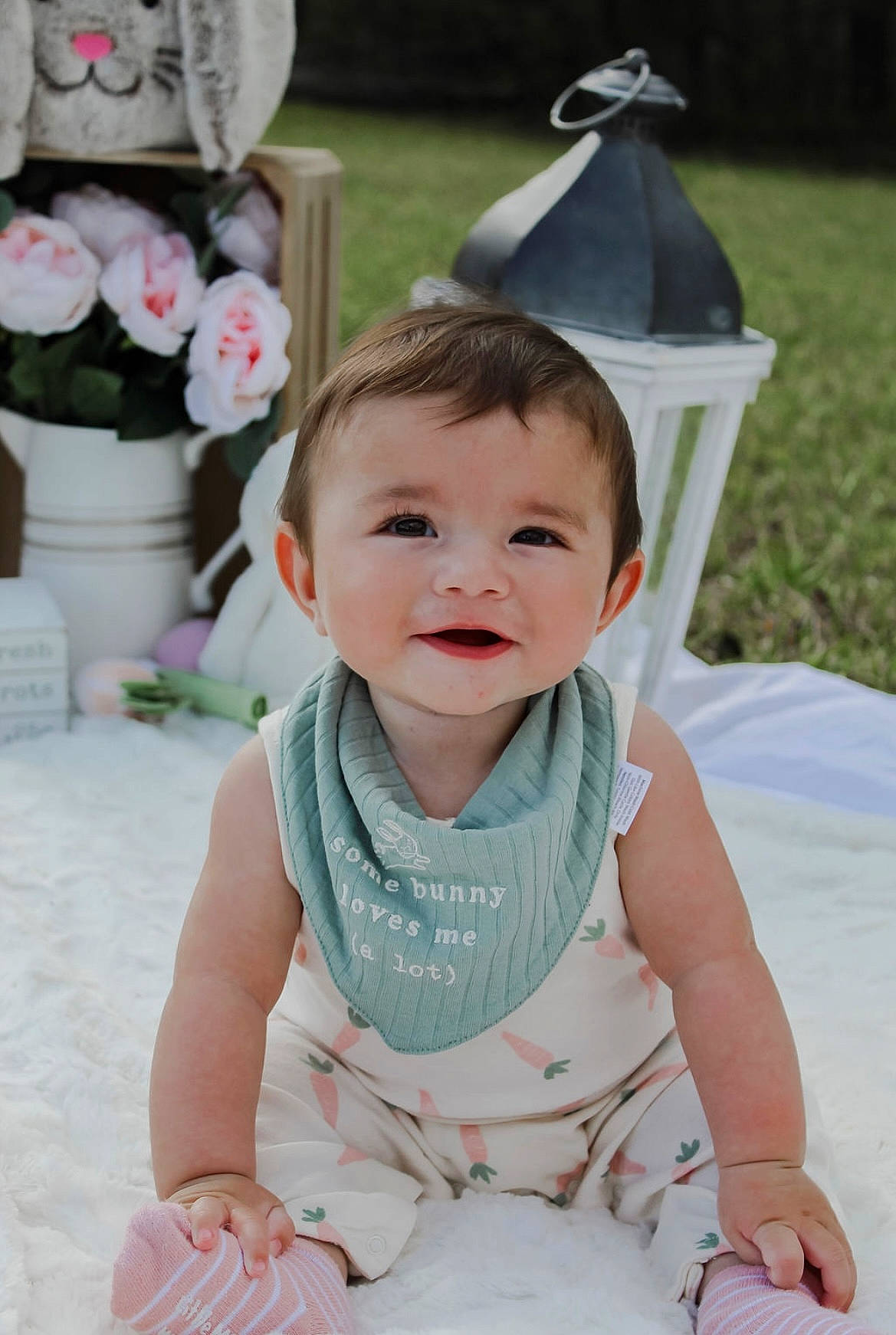 Archie is registered to the contest to win money with this photo: baby, baby_toddler_clothing, dress, facial_expression, flowerpot, grass, hairstyle, happy, houseplant, person, photograph, pink, plant, product, skin, sleeve, smile, summer, textile, toddler