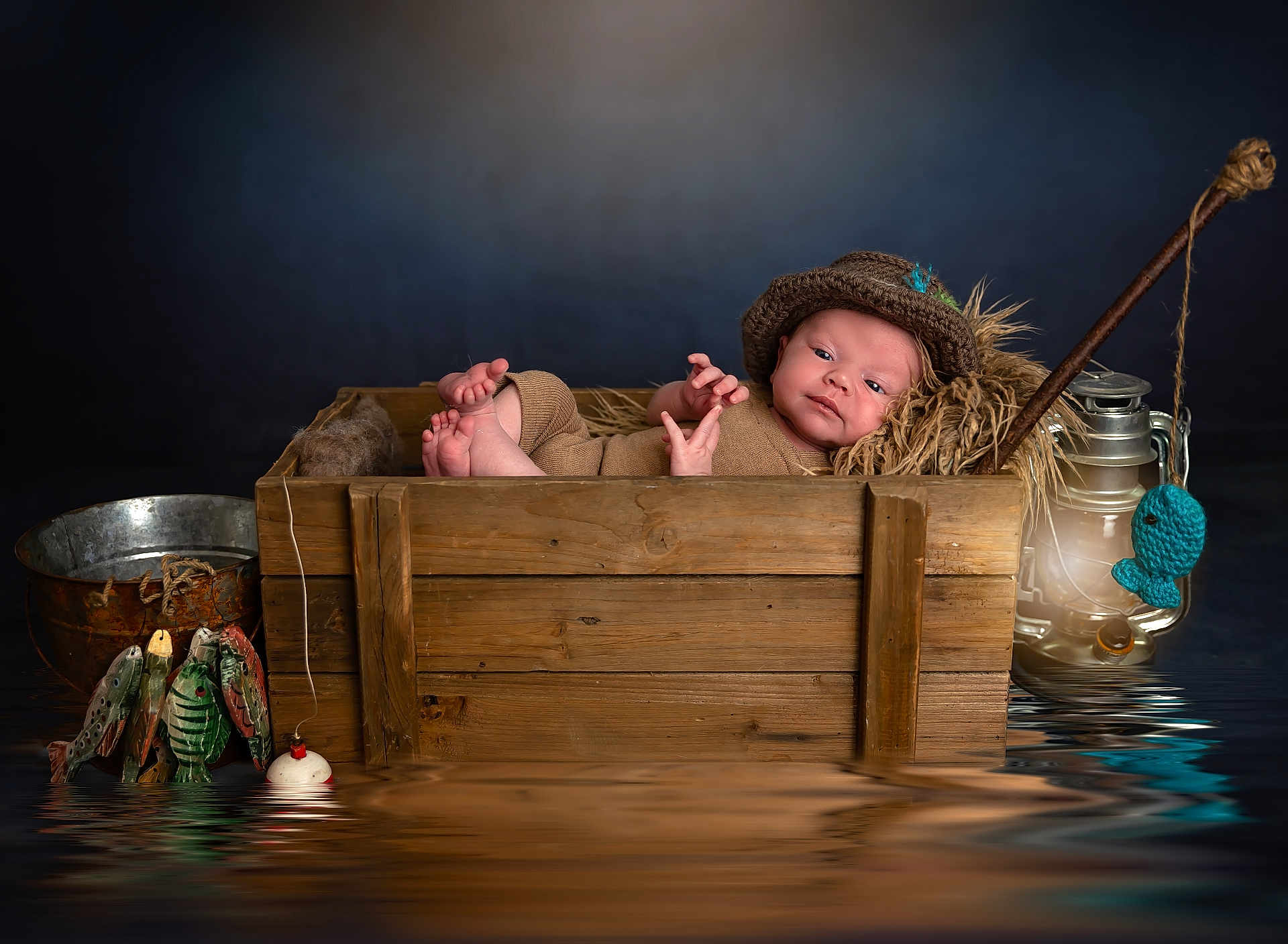 Harbor joined the competition — help win amazing prizes! baby, newborn, wooden_crate, knitted_hat, knitted_outfit, fishing_rod, lantern, wooden_fish, bucket, reflection, water, cozy, rustic, portrait, cute, infant, props, studio, dark_background, smiling
