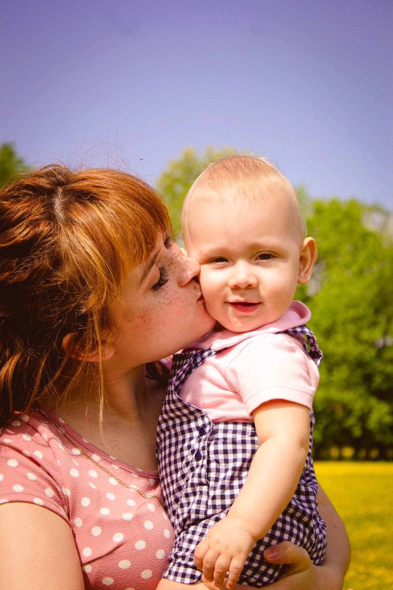 Ralph is registered to the contest to win money with this photo: baby, cheek, child, daughter, fun, grass, happy, interaction, love, mother, people, people_in_nature, person, photograph, photography, skin, sky, smile, summer, toddler