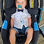 Timéo a rejoint le concours — aidez-le/la à gagner de superbes lots ! baby, child, stroller, pacifier, bow_tie, shirt, denim_shorts, beaded_clip, blue_eyes, sitting, wooden_deck, footwear, cute, infant, outdoor, baby_boy, clothing, face, portrait, baby_accessory
