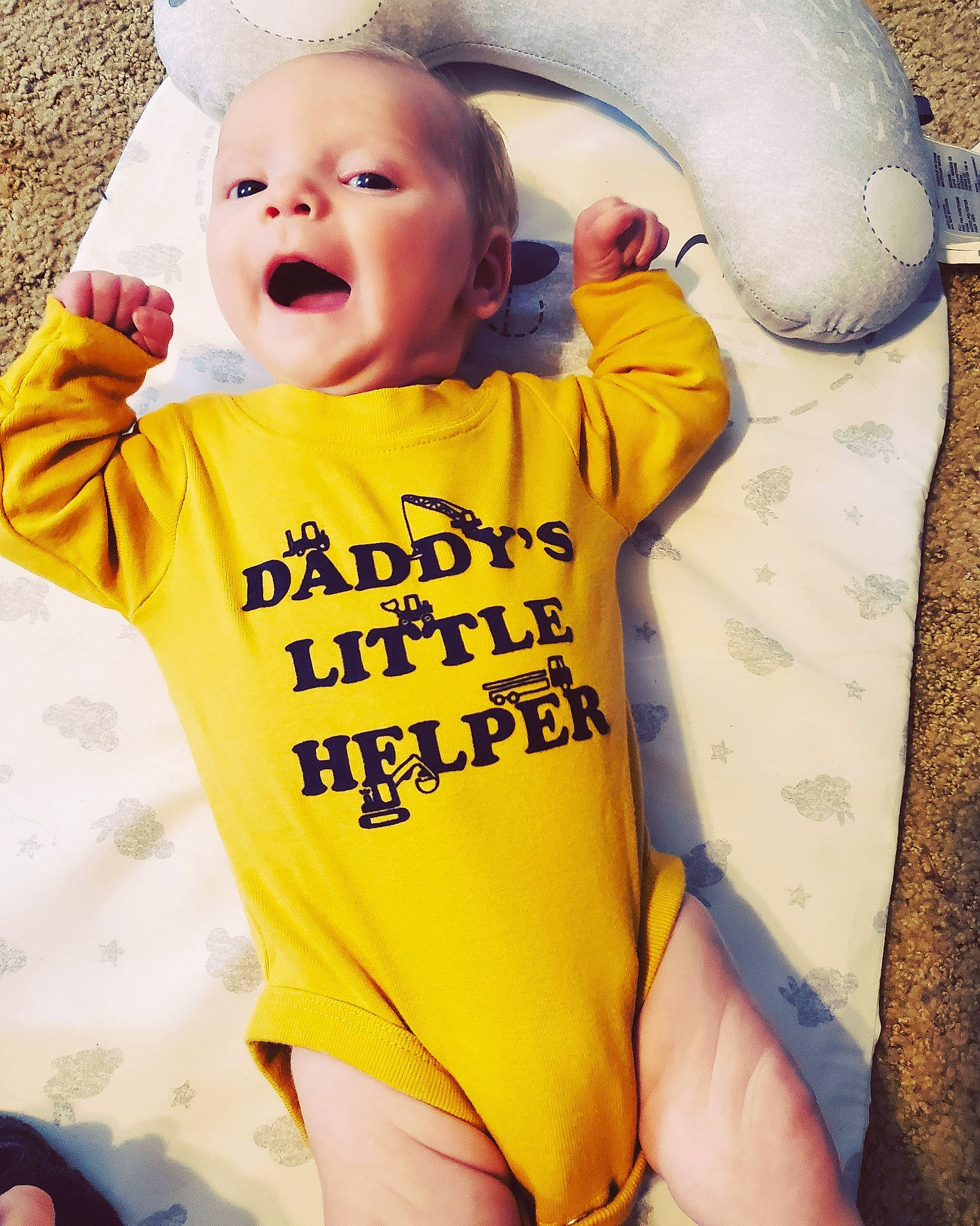 Cedric is registered to the contest to win money with this photo: baby, baby_products, baby_toddler_clothing, banana, blond, child, cool, ear, facial_expression, fun, happy, lip, mouth, organ, person, product, sleeve, smile, t_shirt, toddler